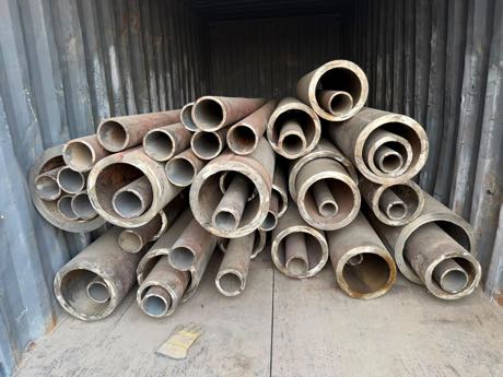 Cut pipe stacked in container